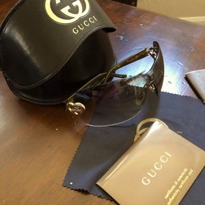 Barely worn authentic Gucci sunglasses, brown